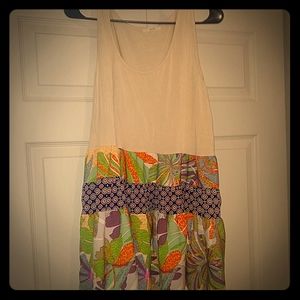 A long green, orange, blue, and cream color tank t